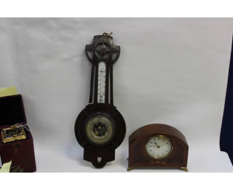 An Edwardian 10 day mantle clock (inlaid) together with a late 19th Century barometer (2)