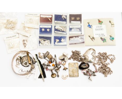 A 925 silver heart pendant on 800 silver chain, 2.12 ozt gross; assorted silver charms and earrings; bangle; propelling penci