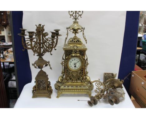 Large late 19th Century brass mantle clock with candelabra's, Arabic numerals  