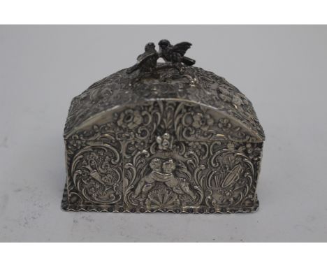A silver casket with love bird finial foliate and cherub repose all over design, London 1881 and 1894 - 3.38 troy oz and 105 