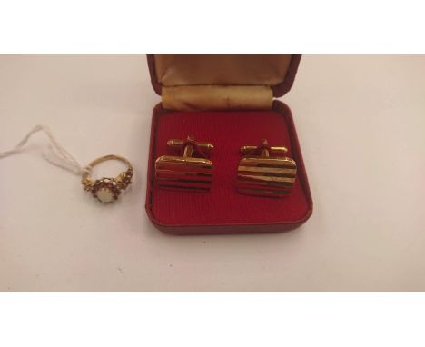 A Birmingham 1940's garnet and trinket opal ring yellow metal, a pair of diamond cut gold plated cufflinks (2)