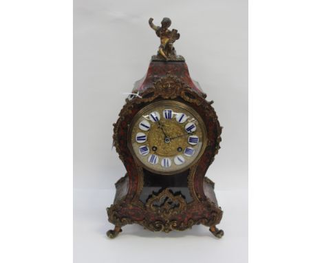 A mid 19th Century Boulle Mantel clock, blue enamel lettering, 42 cms high, x 23 cms wide, key and pendulum present, movement