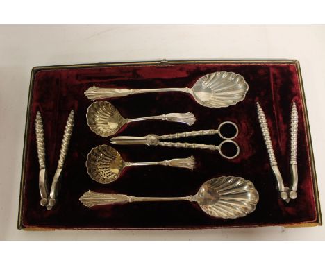  A boxed silver plated dessert flatware service set, to include; a pair of grape scissors with curved bamboo form handles, a 