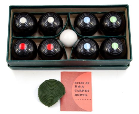 A boxed set of circa 1950's B&A carpet bowls, complete with Rules leaflet