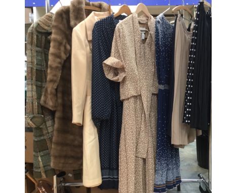 A green/beige check wool Ladies coat. Turned back cuffs, by Julia's, made in England, mid to late 1950's. A fake (faux) fur c