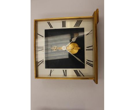 A Jaeger Lecoultre brass mantle clock complete in box with paperwork dated 1972