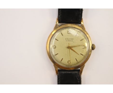  A Baume gentleman's 9ct. gold wrist watch, manual movement, having circular dial with Arabic numeral and gold baton hour mar