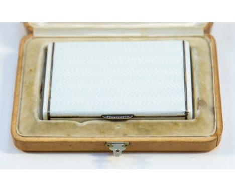A fine Russian boxed Faberge silver gilt and guilloche enamel cigarette case, c.1908-1910, of rectangular form, the exterior 