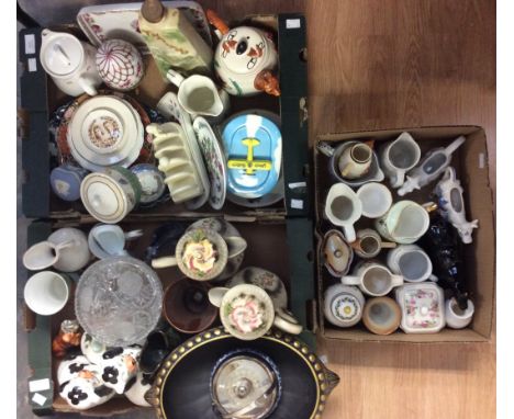 Three boxes of assorted ceramics, including jugs, milk jugs in the form of Cows,a pair of Staffordshire Dogs, Wedgwood trinke