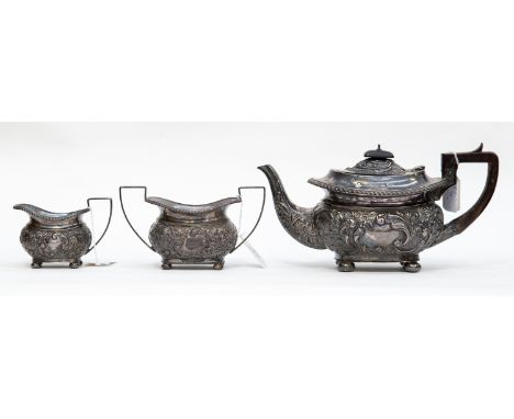 Three piece silver tea set, comprising tea pot, milk and sugar, total weight approx 29.70 ozt, the tea pot being London 1907,