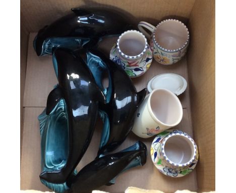 Eight items of Poole Pottery 
