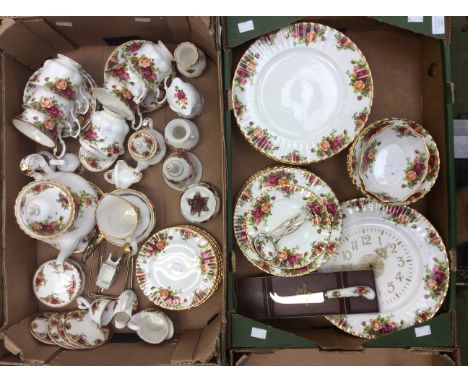Royal Albert Country Roses, dinner and tea service, to include teapot and stand, clock and cake stand, and complimentary ware