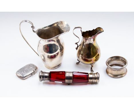 A Victorian double ended ruby glass and plate scent bottle (both stoppers missing) a silver Vesta case, napkin and two variou