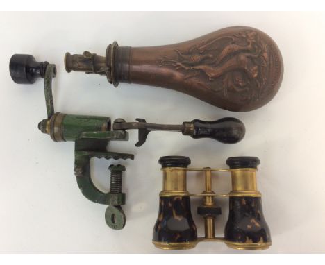 A James Dixon and Sons copper powder flask 19th Century, a pair of opera glasses Edwardian, together with a cartridge loading