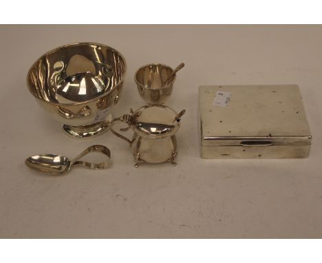 An Elizabeth II silver cigarette box, mustard, sugar bowl and feeding spoon etc (7)