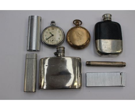 A collectors lot including a silver hip flask; another hip flask plated, two fob watches; a pencil holder and three lighters 