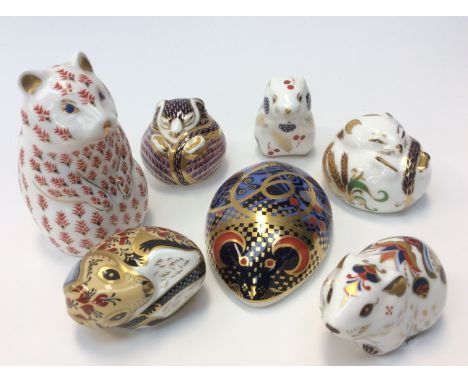 Seven Royal Crown Derby paperweights including: Imari Dormouse 1992, gold stopper; Harvest Dormouse 1993, gold stopper;  Coll