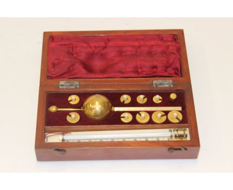 Scientific instruments; a Sykes hydrometer, Buss Hatton Gardens