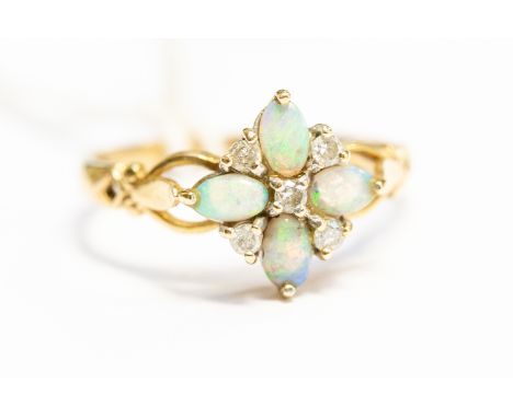 An opal and diamond 9ct gold cluster ring, set with four green opals with diamond accents, size S, total gross weight approx 