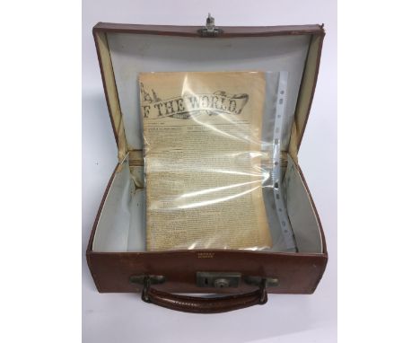 A copy of the first edition of the News of the World October, 1st 1843 and a small leather suitcase (2)