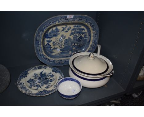 A assortment of blue an white ware including large platter and tureen with lid and matching ladle.
