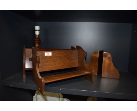 Two vintage Book troughs and a set of wooden book ends, also included is a turned lamp base.