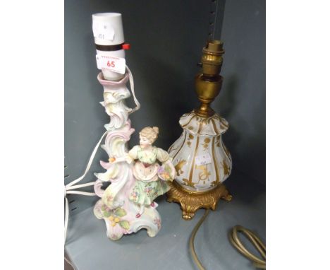 Two ceramic lamp bases including hard paste figural hand decorated and similar squat with gold decoration