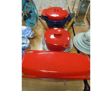 A selection of cast and enamel Creuset style cooking pans and dishes