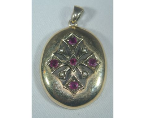 JEWELLERY - A stunning antique 9ct gold, ruby & seed pearl memory locket. Total weight 10g.