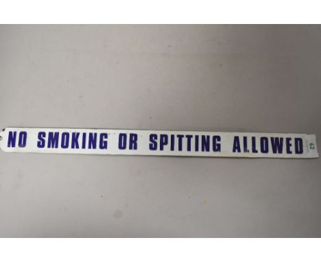 A vintage enamel sign ' No smoking or spitting allowed' .