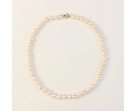 A single strand uniform cultured pearl necklace, the forty four pearls each of approximately 8mm diameter, with attached bead
