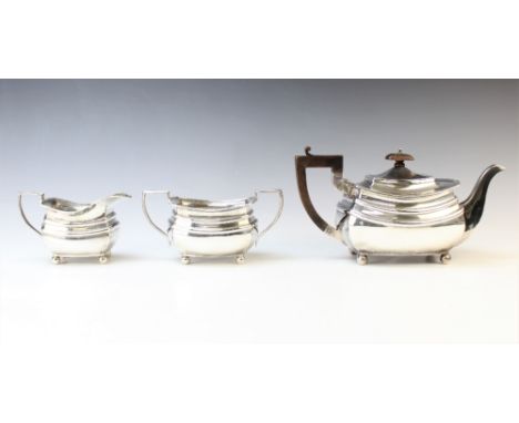 A George V Art Deco period three-piece silver tea service, S. Blackensee & Son, Chester and Birmingham 1934, comprising a tea