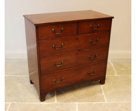 A 19th century chest of drawers, with an arrangement of two short and three long drawers, applied with angular swing handles,