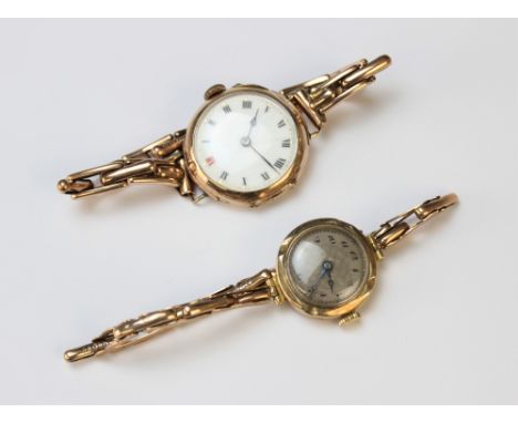 A Lady's vintage 9ct gold wristwatch, the round white enamel dial with Roman numeral markers set to a plain polished case, im
