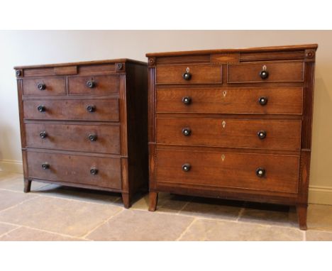 A near pair of George IV oak chest of drawers, each with arrangement of two short and three long graduated and cock beaded dr