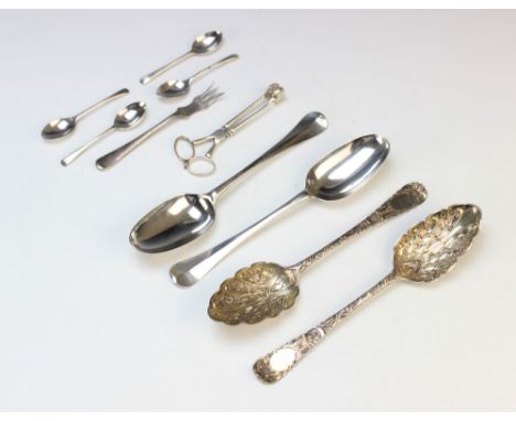 A pair of silver spoons, William Eley and William Fearne, London 1806, with cast acanthus detail and vacant cartouche, with a