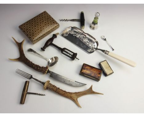 A silver plated Victorian crumb scoop with ivory handle, 33.5cm long, a silver plated sugar sifter spoon, and an antler handl