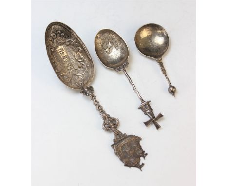 A Continental (possibly Dutch) silver spoon, indistinctly marked, with embossed decoration to bowl, pierced decoration handle