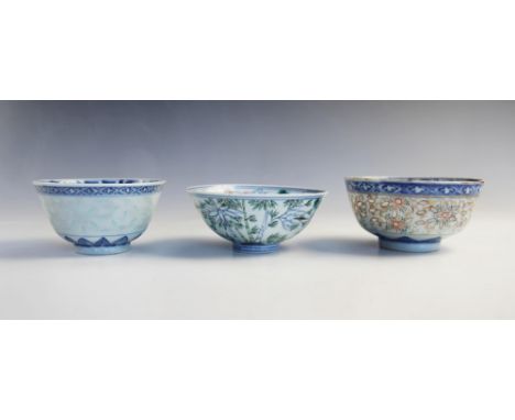 A Chinese porcelain bowl, Jiaqing seal mark, decorated in Doucai enamels, 11.5cm wide, with two rice grain porcelain bowls, w