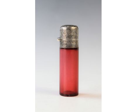 A Victorian ruby glass and silver mounted scent bottle, possibly Birmingham 1892, (maker's mark worn), of cylindrical form wi