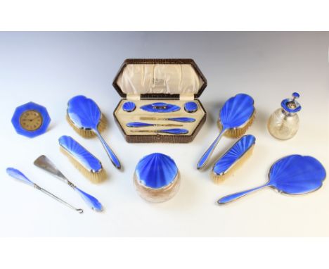 A George V silver and guilloche enamel fifteen piece dressing table set by Albert Carter, Birmingham 1931-32, comprising mirr