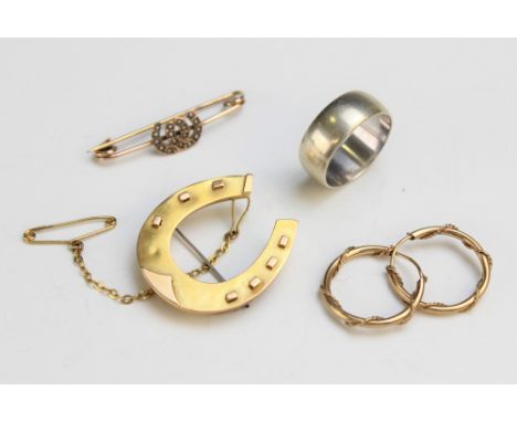 A 15ct yellow gold horseshoe brooch, 31mm x 28mm, weight 2.9gms, together with a seed pearl set double horseshoe brooch, 3.5c