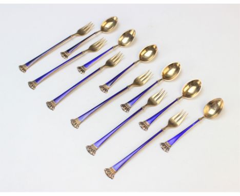 A twelve piece Danish silver gilt and enamel cutlery set by Egon Lauridsen, comprising six coffee spoons and six dessert fork