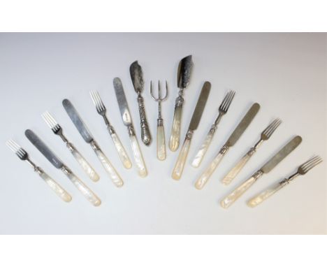 A set of twelve silver and mother of pearl handled fruit knives and forks, John Gammage, Birmingham 1851 and 1852, each with 
