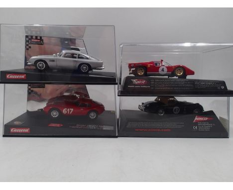 Carrera - Ninco - Spirit. Four boxed slot cars to include: Carrera Aston Martin DB5. All appearing in NM condition housed in 
