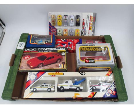 Digitcon - Ferrari Testarossa. A boxed, unused RC Ferrari Testarosa by Digitcon. Batteries included, the 1:24 scale model is 