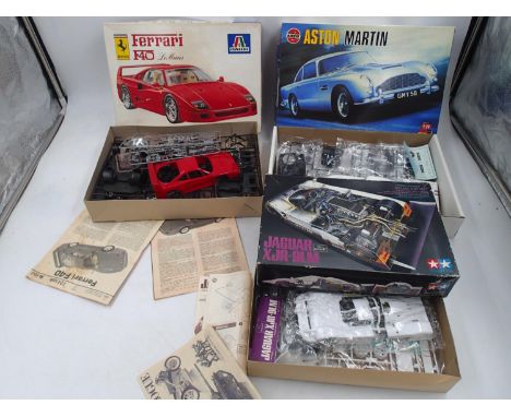 Airfix - Tamiya - Italeri. Three boxed model kits appearing complete and in excellent condition. Tamiya Jaguar XJR-9LM, Itale