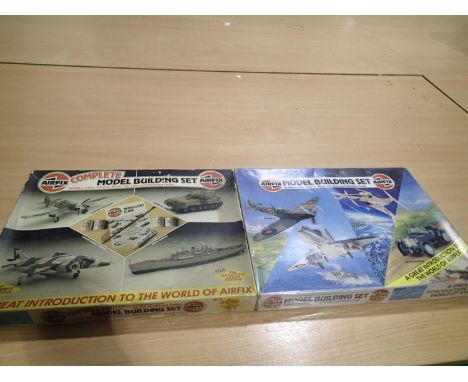 Two Airfix four kit sets comprising 1) Typhoon, Harrier, Scorpion, and Leander, and 2) Spitfire, Skyhawk, Angel Interceptor, 