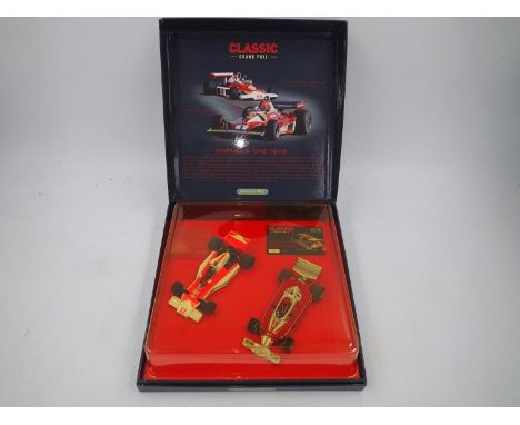 Scalextric - Classic Grand Prix. Boxed Scalextric C2558A Classic Grand Prix Formula One 1976 Mclaren-Ford M23 / James Hunt Fe