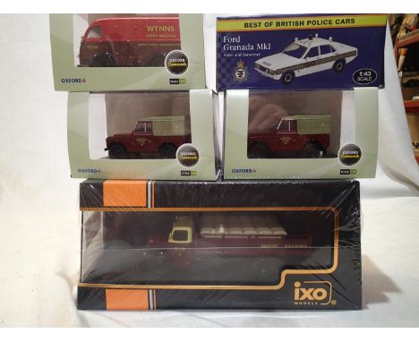 Five O gauge 1/43 scale vehicles, IXO Ford Thames ET 6, BR livery, two Oxford Land Rover, BR livery, Oxford Austin van Wynns,